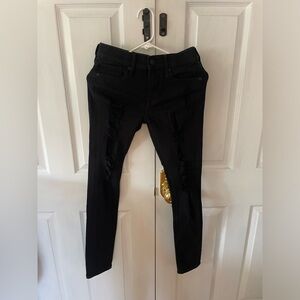 Express Black Denim Jeans with distressed area on front of thighs